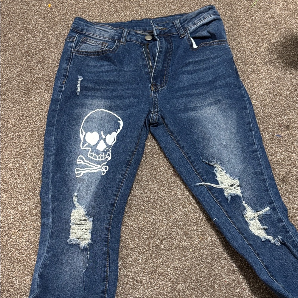 Women's Distressed Blue Jeans with Skull Design